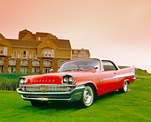 AUT 21 RK1884 01
1958 Chrysler Saratoga Red And White 3/4 Front View On Grass By Mansion
