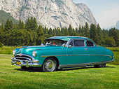 AUT 21 RK2129 01
1953 Hudson Hornet Green Coupe Front 3/4 View On Grass By Trees Sky