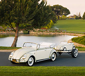 AUT 21 RK2410 01
1958 Volkswagen Beetle Convertible White And Gray 3/4 Front View On Pavement By Pond Towing Scale Model