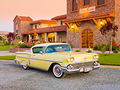 AUT 21 RK2435 01
1958 Chevrolet Impala Yellow 3/4 Front View On Gravel By Building