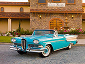 AUT 21 RK2451 01
1958 Edsel Citation Convertible Turquoise 3/4 Front View On Gravel By Building