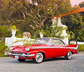AUT 21 RK2462 01
1958 Packard Red 3/4 Front View On Pavement By Trees And Wall