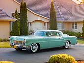 AUT 21 RK2479 01
1956 Lincoln Continental Mark II Light Green 3/4 Front View On Pavement By House