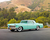 AUT 21 RK2482 01
1956 Lincoln Continental Mark II Light Green 3/4 Front View On Pavement By Hills