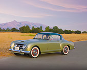 AUT 21 RK2494 01
1954 Nash-Healey LeMans Coupe Green 3/4 Front View On Pavement By Field