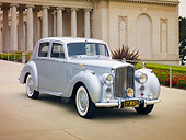 AUT 21 RK2503 01
1952 Bentley R Type Silver 3/4 Front View On Pavement By Building
