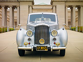 AUT 21 RK2504 01
1952 Bentley R Type Silver Front View On Pavement By Building