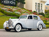 AUT 21 RK2505 01
1952 Bentley R Type Silver 3/4 Front View On Pavement By House