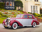 AUT 21 RK2512 01
1954 Rolls-Royce Silver Dawn Silver And Maroon 3/4 Front View On Pavement By House