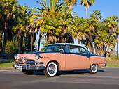 AUT 21 RK2514 01
1955 Dodge Royal Lancer Pink 3/4 Front View On Pavement By Palm Trees