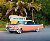 AUT 21 RK2518 01
1955 Dodge Royal Lancer Pink 3/4 Front View On Pavement By Palm Trees