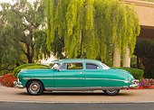 AUT 21 RK2523 01
1953 Hudson Hornet Green Profile View On Pavement By Trees And Building