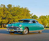 AUT 21 RK2527 01
1953 Hudson Hornet Green 3/4 Front View On Pavement By Trees