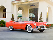 AUT 21 RK2570 01
1956 Ford Thunderbird Convertible Coral 3/4 Front View On Pavement By Building
