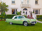 AUT 21 RK2572 01
1957 Ford Thunderbird Green And White 3/4 Front View On Grass By Building