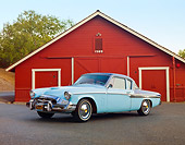 AUT 21 RK2584 01
1955 Studebaker Commander Coupe Blue 3/4 Front View On Pavement By Barn