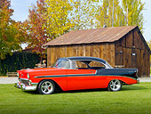 AUT 21 RK2590 01
1956 Chevrolet Bel Air Red And Black 3/4 Front View On Grass By Barn