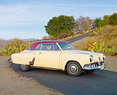 AUT 21 RK2609 01
1952 Studebaker Commander Starliner Coupe Cream 3/4 Front View On Pavement By Hill