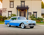 AUT 21 RK2617 01
1956 Oldsmobile Super 88 Blue On Road In Front Of A House