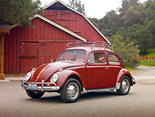 AUT 21 RK2624 01
1956 Volkswagen Oval Bug Burgandy 3/4 Side View On Pavement By Barn