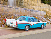 AUT 21 RK2635 01
Mercury Grand Marquis DeSoto Custom Blue And White 3/4 Rear View On Pavement By Waterfall