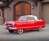 AUT 21 RK2639 01
1955 Nash Metropolitan Convertible Red 3/4 Side View On Gravel By House
