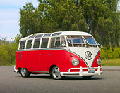 AUT 21 RK2685 01
1959 Volkswagen 23 Window Microbus Raspberry And White 3/4 Front View On Pavement By Trees