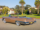 AUT 21 RK2726 01
1958 Cadillac El Dorado Biarritz Bronze 3/4 Rear View On Pavement By Trees And Building