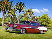 AUT 21 RK2742 01
1958 Pontiac Chieftain Maroon 3/4 Front View On Grass By Palm Trees