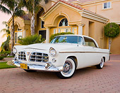 AUT 21 RK2764 01
1956 Chrysler 300B White 3/4 Front View On Brick By House