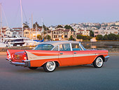 AUT 21 RK2781 01
1958 DeSoto Fireflite Orange 3/4 Rear View On Pavement By Harbor