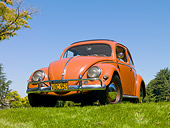 AUT 21 RK2804 01
1956 Volkswagen Beetle Coral Red 3/4 Front View On Grass