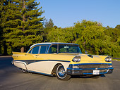 AUT 21 RK2814 01
1958 Ford Fairlane 500 Yellow And White 3/4 Front View On Pavement By Trees