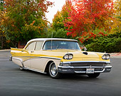AUT 21 RK2815 01
1958 Ford Fairlane 500 Yellow And White 3/4 Front View On Pavement By Trees