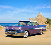 AUT 21 RK2819 01
1957 Pontiac Starchief Evening Orchid 3/4 Front View On Sand By Ocean