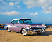 AUT 21 RK2822 01
1957 Pontiac Starchief Evening Orchid 3/4 Front View On Sand By Ocean
