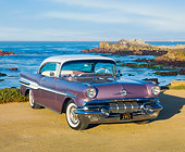 AUT 21 RK2824 01
1957 Pontiac Starchief Evening Orchid 3/4 Front View On Sand By Ocean