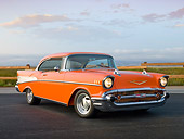 AUT 21 RK2866 01
1957 Chevrolet Bel Air Orange 3/4 Front View On Pavement By Grass Field And Fence