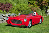 AUT 21 RK2881 01
1958 Moore Roadster Red 3/4 Front View On Grass By Stones And Shrubs