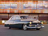 AUT 21 RK2884 01
1950 Mercury 4-Door Green And Gold 3/4 Front View On Parking Lot At Dusk