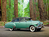 AUT 21 RK3024 01
1952 Chevrolet Styleline Green 3/4 Side View On Pavement By Redwood Trees