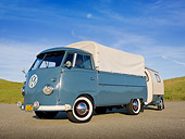 AUT 21 RK3027 01
1956 Volkswagen Single Cab Bus With 1960 Austermann Knospe Trailer Dove Blue And White 3/4 Front View On Pavement By Grass