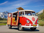 AUT 21 RK3034 01
1959 VW SO23 Westfalia Camper Red And Beige Gray 3/4 Front View On Pavement By Grass