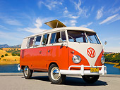 AUT 21 RK3037 01
1959 VW SO23 Westfalia Camper Red And Beige Gray 3/4 Front View On Pavement By Lake