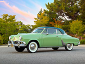 AUT 21 RK3052 01
1952 Studebaker Commander Coupe Green 3/4 Side View On Pavement By Trees
