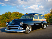 AUT 21 RK3069 01
1951 Chevrolet Tin Woody Black 3/4 Front View On Pavement By Trees