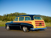 AUT 21 RK3071 01
1951 Chevrolet Tin Woody Black 3/4 Rear View On Pavement By Trees