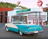 AUT 21 RK3100 01
1956 Oldsmobile Super 88 Teal And White 3/4 Rear View On Pavement By Gas Station