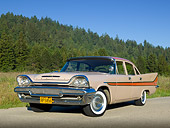 AUT 21 RK3105 01
1958 Desoto Firesweep Autumn Rust And Rose Beige 3/4 Front View On Road By Evergreen Trees