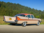 AUT 21 RK3113 01
1958 Desoto Firesweep Autumn Rust And Rose Beige 3/4 Rear View On Road By Evergreen Trees